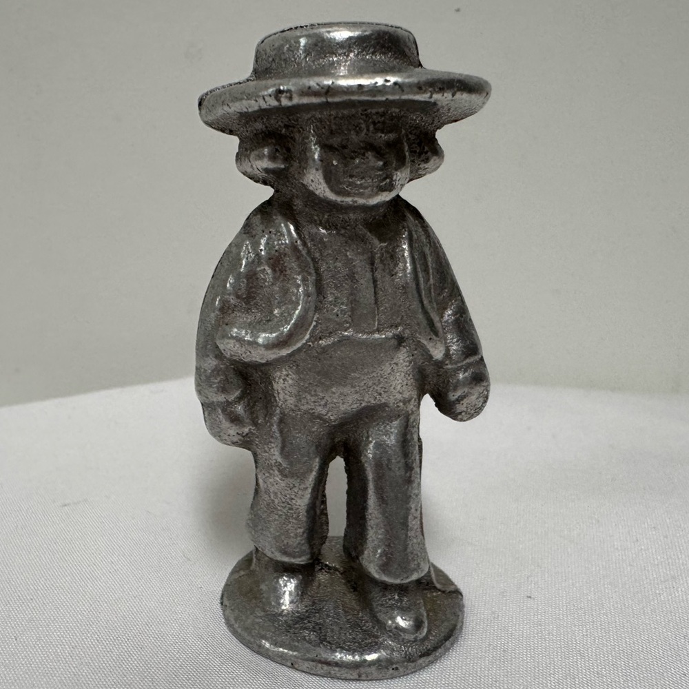 Vintage Amish Pewter Boy figurine.